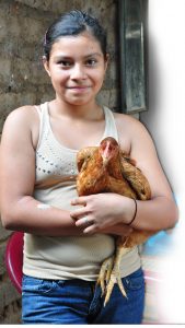 Yaquelin with her pet chicken, Agua Santa (Sonsonate), 8.12